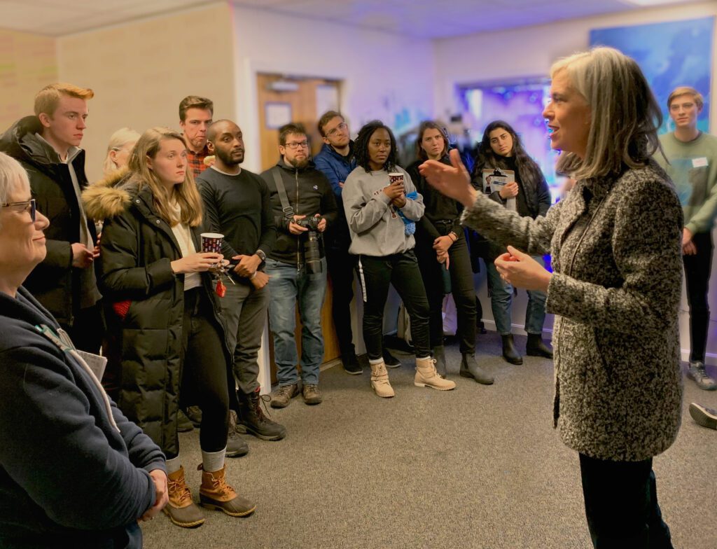 Why I'm running: Assistant Speaker Katherine Clark addresses a group of volunteers at a campaign office.